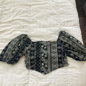 Altar’d state crop top. Size large. Ties in the back